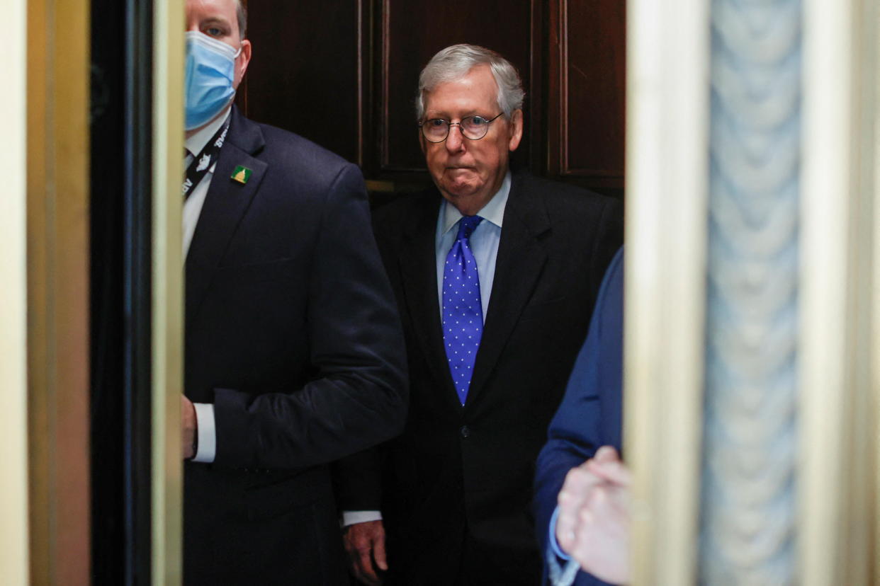 Senate Minority Leader Mitch McConnell departs after a Senate Republican caucus luncheon on Capitol Hill.