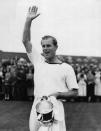 <p>Keen polo player Philip led a cheer after in winning a match in May 1954. Photo: Getty Images.</p> 