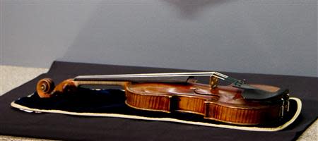 The 300-year-old Stradivarius violin that was taken from the Milwaukee Symphony Orchestra's concertmaster in an armed robbery is on display for the media after it was recently recovered, in Milwaukee, Wisconsin February 6, 2014. REUTERS/Darren Hauck