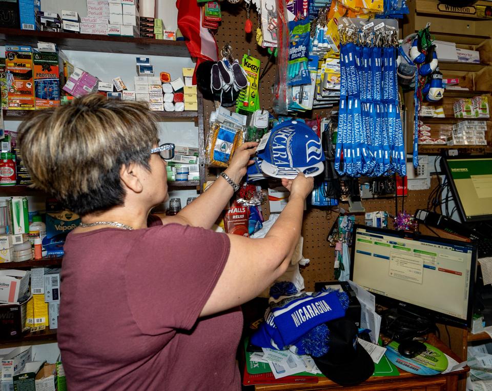 Juana Barajas, owner of La Tienda Mexicana San Jose, has noticed the increase in Nicaraguan migrants to Whitewater. She has added some Nicaraguan merchandise, like lanyards and hats, to her shop.