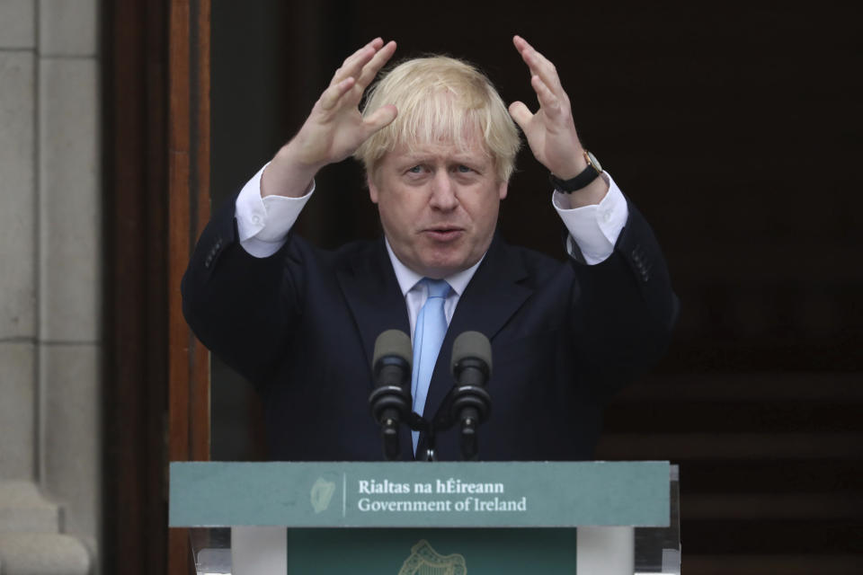 Britain's Prime Minister Boris Johnson gestures during a meeting with Ireland's Prime Minister Leo Varadkar at Government Buildings in Dublin, Monday Sept. 9, 2019. Boris Johnson is to meet with Leo Varadkar in search of a compromise on the simmering Brexit crisis. (Niall Carson/PA via AP)