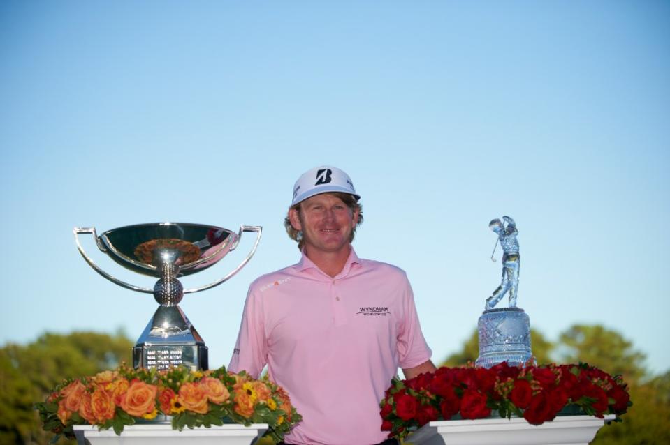 Golf: Tour Championship: Brandt Snedeker victorious with FedEx Cup trophy (L) and tournament trophy (R) after winning on Sunday at East Lake GC. (Photo by Fred Vuich via Getty Images)