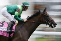 Speak of the Devil, with Flavien Prat aboard, wins the fifth race of the day at Churchill Downs Saturday, May 7, 2022, in Louisville, Ky. The 148th running of the Kentucky Derby horse race is scheduled for later in the day. (AP Photo/Charlie Neibergall)