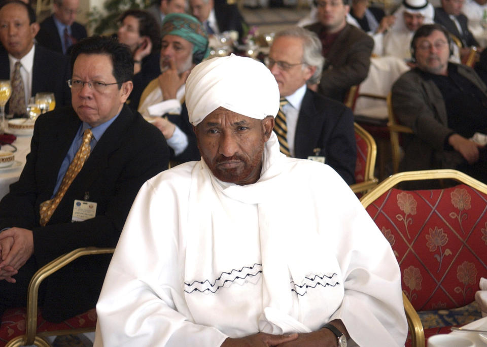 FILE - In this April 11, 2005 file photo, former Sudanese Prime Minister and head of the National Umma Party, Sadiq Al-Mahdi attends a US-Islamic World Forum meeting held in Doha, Qatar. Al-Mahdi, 84, died of COVID-19 late on Wednesday, Nov. 25, 2020, at a hospital in the United Arab Emirates, his party said. (AP Photo, File)