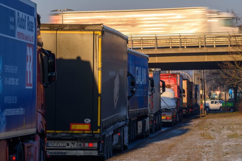 Trucks jam up in front of the blocked A2 highway exit Magdeburg-Rothensee in the direction of Hanover as part of a statewide protest. Klaus-Dietmar Gabbert/dpa