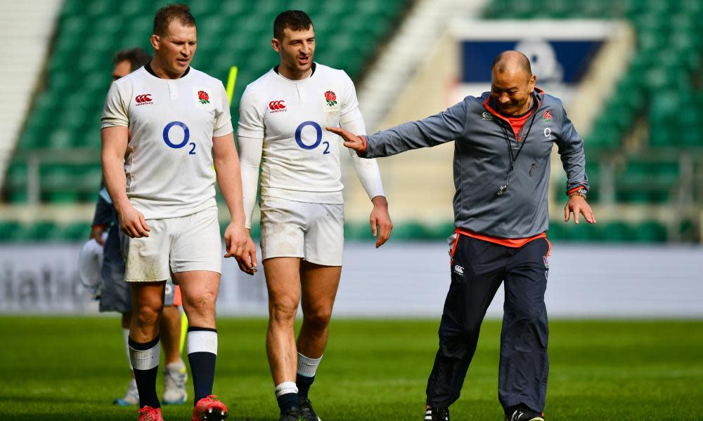 Dylan Hartley and Jonny May share a joke with Eddie Jones.