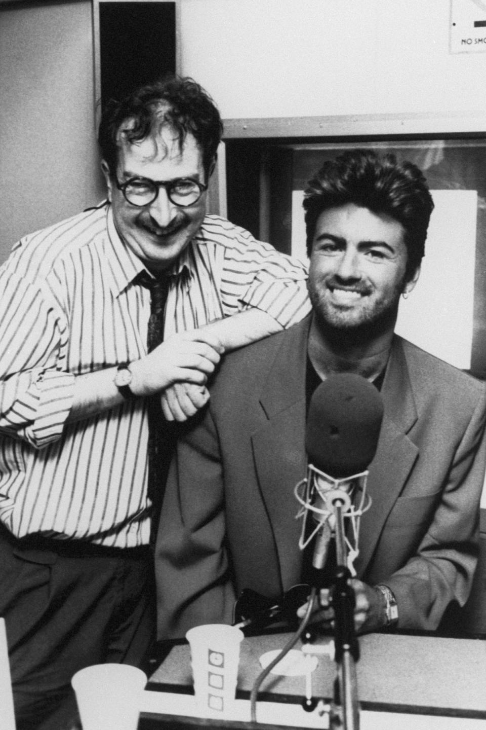 Steve Wright pictured interviewing singer George Michael in 1990 (PA/PA Wire)