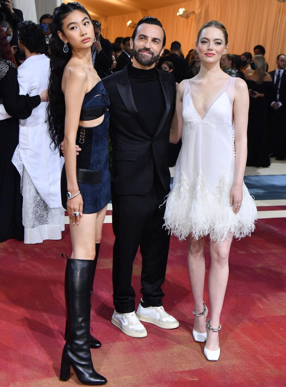 South Korean actress Jung Hoyeon (L), French designer Nicolas Ghesquière (C) and US actress Emma Stone (R) arrive for the 2022 Met Gala