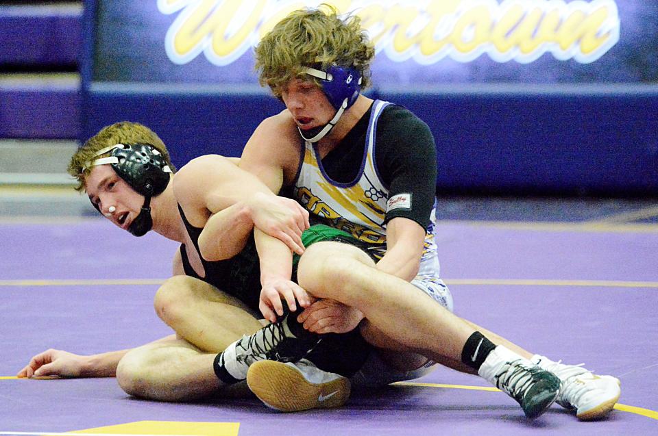 Watertown's Ian Johnson battles for control with Pierre's Chase Carda during their 152-pound match in an Eastern South Dakota Conference wrestling dual on Thursday, Jan. 12, 2023 in the Civic Arena.