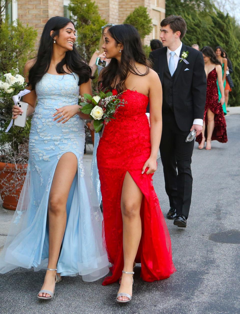 Tower Hill School prom attendees show off their dresses at the DuPont Country Club on April 9, 2022.