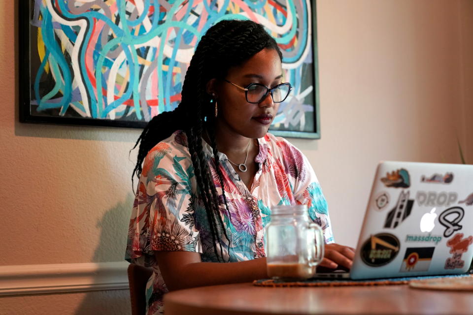 Jaleesa Garland, a marketing manager at an e-commerce startup, works in her apartment in Tulsa, Oklahoma, July 9, 2021. REUTERS/Nick Oxford