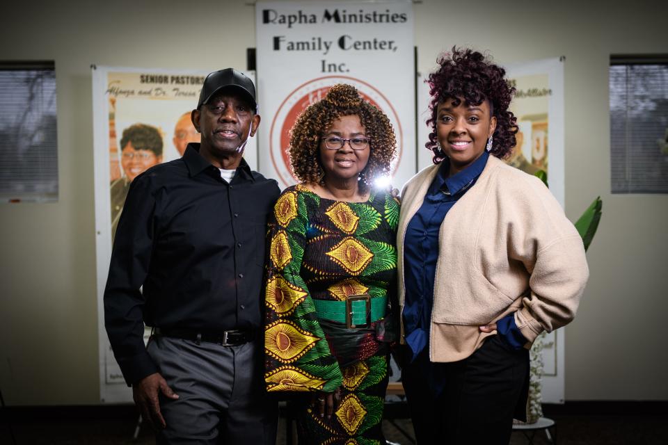 Dr. Teresa McAllister, center, with her husband, Alfonza McAllister, and their daughter, Stephanie White. Dr. Teresa McAllister heads up Rapha Ministries, which is a small church she founded in 2003 that does outreach work, including a food pantry, a summertime family summit, tutoring for grades K-5 and WIDU radio show.