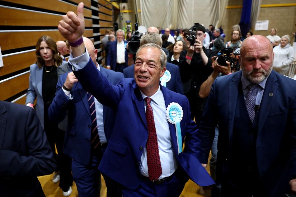 <p>Reform UK leader Nigel Farage reacts after being elected to become MP for Clacton at the Clacton count centre in Clacton-on-Sea</p> (AFP via Getty Images)