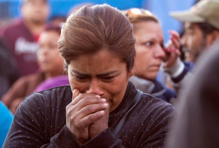 A woman cries as relatives of inmates gather outside the Topo Chico prison in the northern city of Monterrey, Mexico on February 11, 2016
