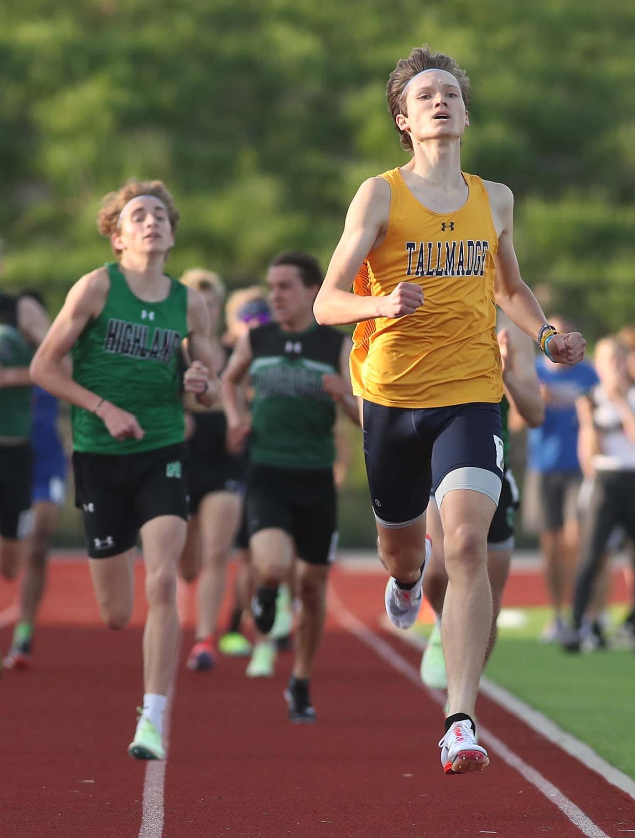 Jared Newenhisen of Tallmadge runs to a first place finish and a meet record time of 1:59.28 in the 800 meter run during the Suburban League American Conference Meet at Tallmadge High School in Tallmadge on Tuesday. 