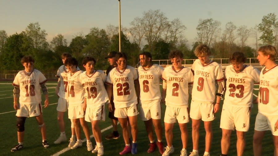 <em>Elmira boys lacrosse celebrated 10 seniors on Monday night. (Pictured) the veteran leaders share a special moment before game-time. </em>