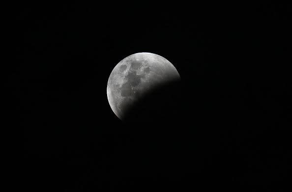 The start of a lunar eclipse on November 8, 2022, over Brisbane, Australia.