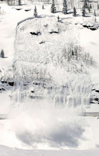 PHOTO: In this March 30, 2006 file photo, an avalanche set off by the Colorado Department of Transportation slides down over U.S. Highway 550 south of Silverton, Colo. (Jerry McBride/AP)