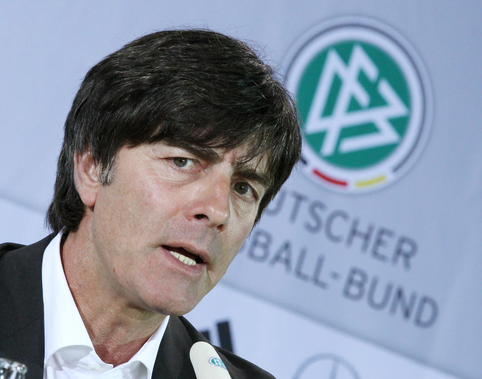 Coach of German national soccer team, Joachim Loew, presents his team for the Euro 2012 in Poland and Ukraine during a press conference in Rastatt, Germany, Monday, May 7, 2012. (AP Photo/Michael Probst)