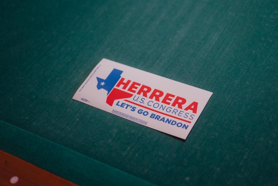 A campaign sticker for Brandon Herrera, Republican candidate for the US House for Texas’ 23rd congressional district, is seen at a campaign event at the Angry Elephant, a politically themed bar, March 14, 2024 in San Antonio.