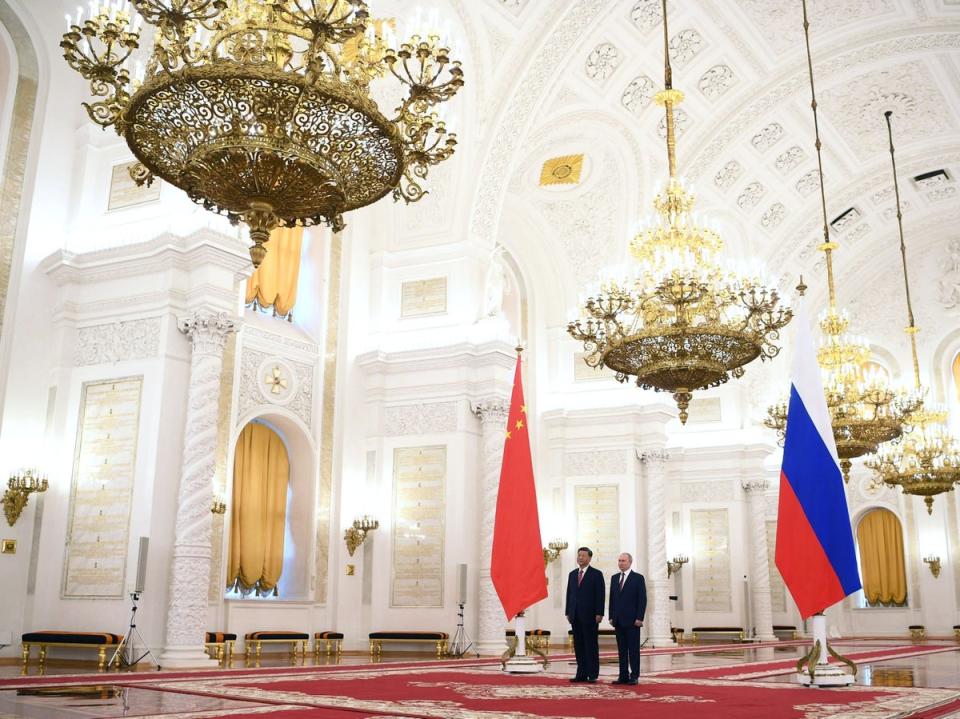 Vladimir Putin meets Xi Jinping at the Kremlin in Moscow in 2013 (Getty)