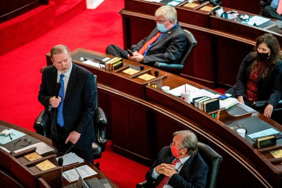Senate Leader Phil Berger, left, speaks on the Senate floor Monday, March 1, 2021 at North Carolina General Assembly before a failed veto override vote on SB 37, the schools reopening bill Gov. Cooper vetoed. Some North Carolina schools have been remote-only for nearly a year.