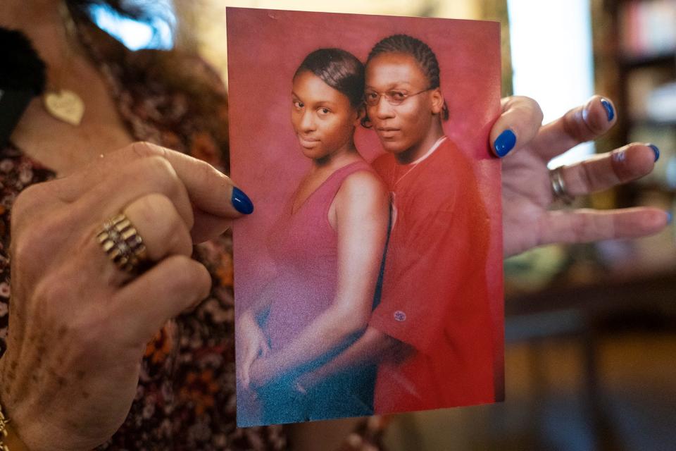 Vanessa Conner recalls memories of Ortralla Mosley as she holds a photo of Mosley and Marcus McTear while in her home in Liberty Hill Wednesday, Feb. 8, 2023. Conner was Mosley's teacher and was with her as she died. 