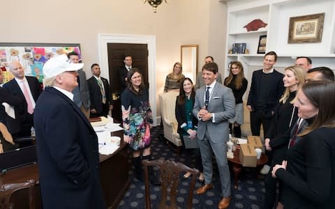 President Donald J. Trump meets with White House senior staff members including Sarah Huckabee Sanders and Hope Hicks - Credit: White House