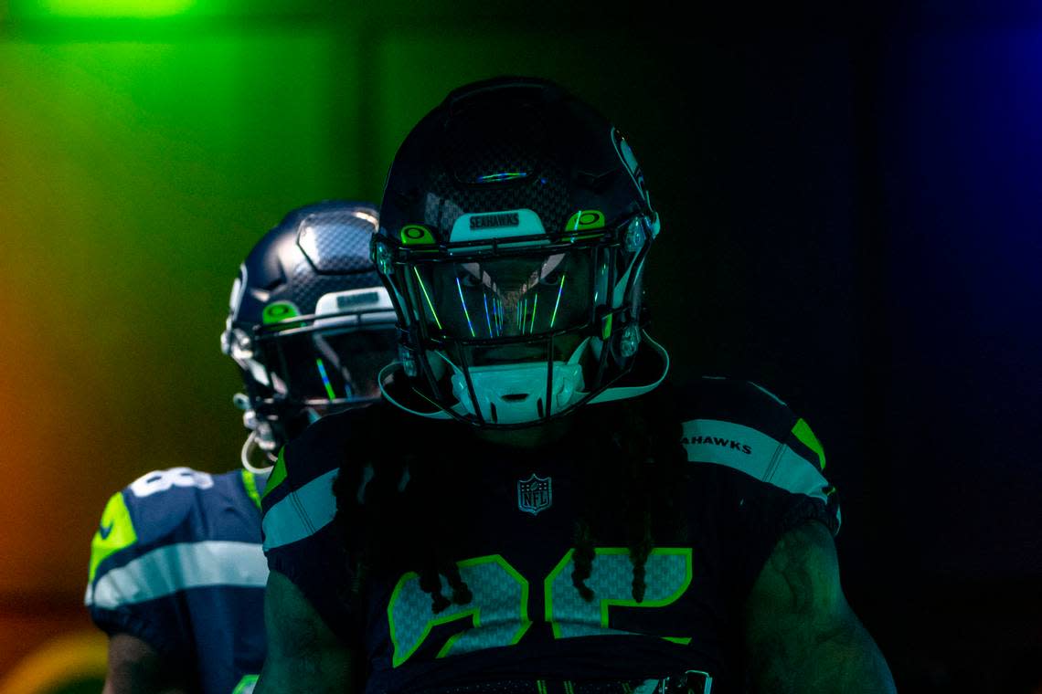 Seattle Seahawks safety Ryan Neal (26) walks through the tunnel on his way toward the field prior to the start of an NFL game against the Las Vegas Raiders on Sunday, Nov. 27, 2022, at Lumen Field in Seattle.
