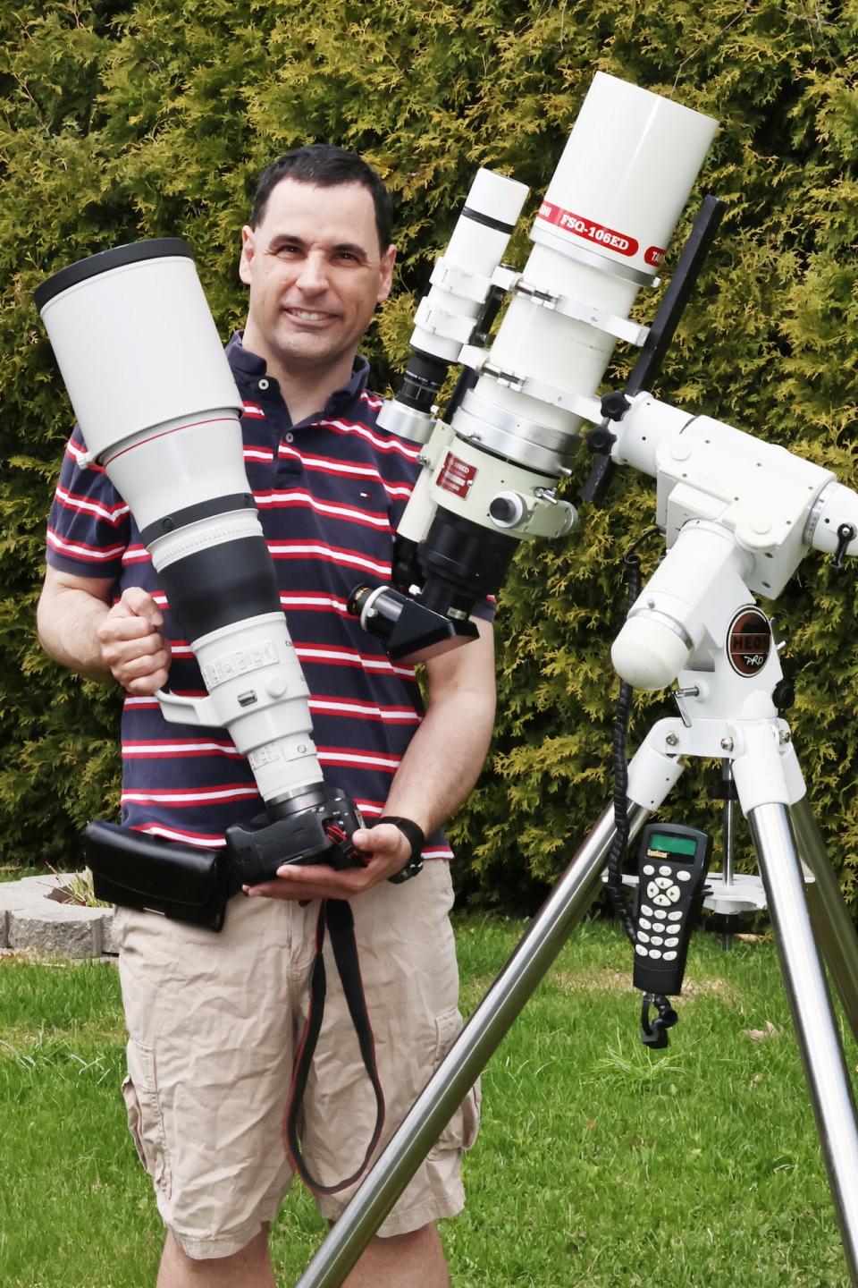 Philippe Moussette, an astronomy photographer based in Quebec City, is pictured with the gear he uses to photograph total solar eclipses.