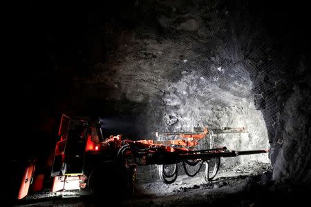 A worker operates an electric jumbo drill at Goldcorp Inc's Borden all-electric underground gold mine near Chapleau, Ontario, Canada, June 13, 2018. REUTERS/Chris Wattie