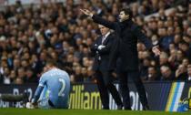 Britain Soccer Football - Tottenham Hotspur v Stoke City - Premier League - White Hart Lane - 26/2/17 Tottenham manager Mauricio Pochettino gestures during the match as Stoke City manager Mark Hughes looks on Action Images via Reuters / Peter Cziborra Livepic