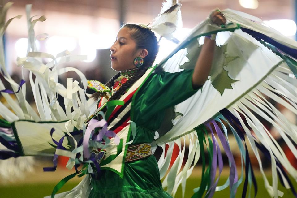 Matty Littlecreek performs in a dance competition during the Austin Powwow.