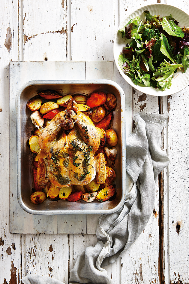 Sally recommends using the oven to make a roast - like this Lemon and herb Roast Chicken. Photo: Supplied