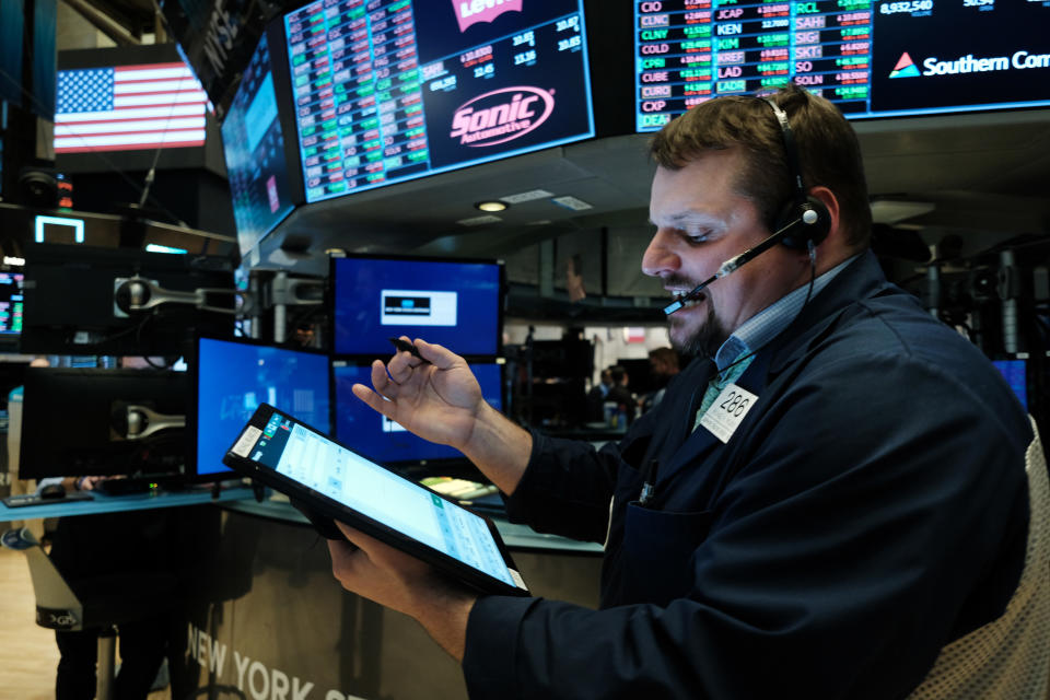 NEW YORK, NEW YORK - MARCH 20: Traders work on the floor of the New York Stock Exchange (NYSE) on March 20, 2020 in New York City. Trading on the floor will temporarily become fully electronic starting on Monday to protect employees from spreading the coronavirus. The Dow fell over 500 points on Friday as investors continue to show concerns over COVID-19.  (Photo by Spencer Platt/Getty Images)