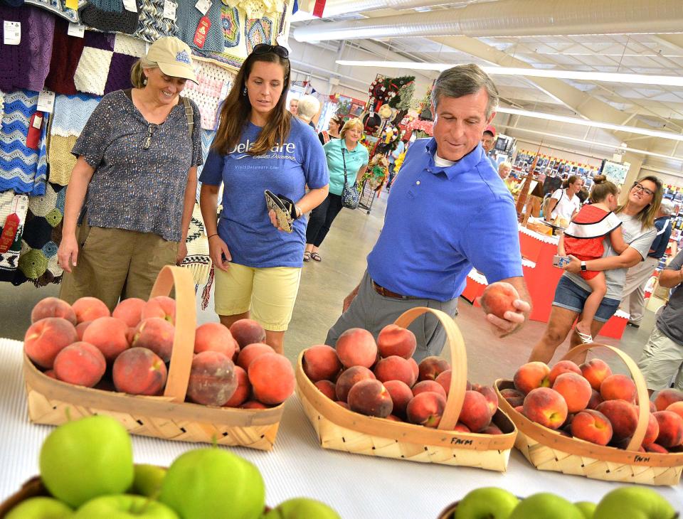 Gov. John Carney spent Thursday in Harrington, checking out exhibits, presenting awards and participating in the annual FFA Games during Governor's Day at the Delaware State Fair in 2019.