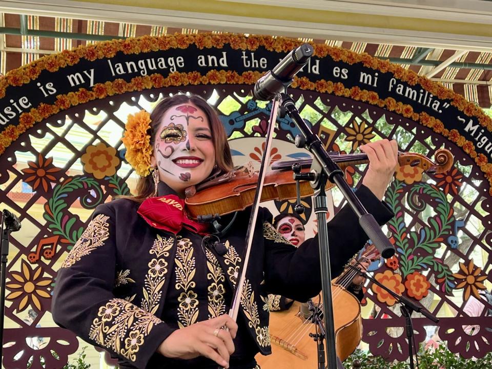 Mariachi Divas perform in Dia de los Muertos makeup.