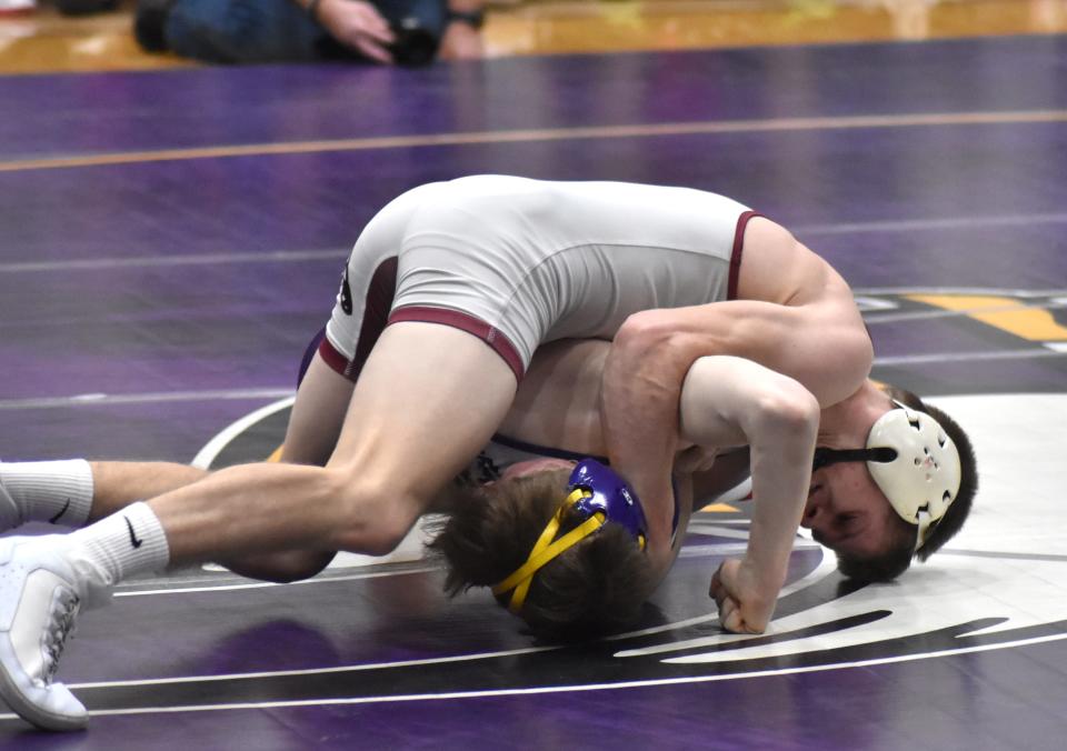 Union City's Landyn Crance runs the half on the way to a pin fall win over Logan Long Wednesday night