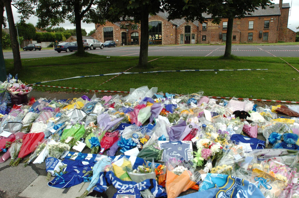 Flowers laid outside the Fir Tree pub, Croxteth Park, in memory of murdered Rhys Jones.