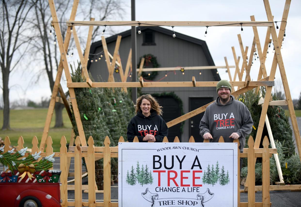 Susan Ferguson and youth pastor Andrew Dalrymple of Woodlawn Church in Jackson Township are spearheading "Buy a Tree Change a Life," an annual fundraiser which raises money for local children's nonprofits.
(Photo: Julie Vennitti Botos)