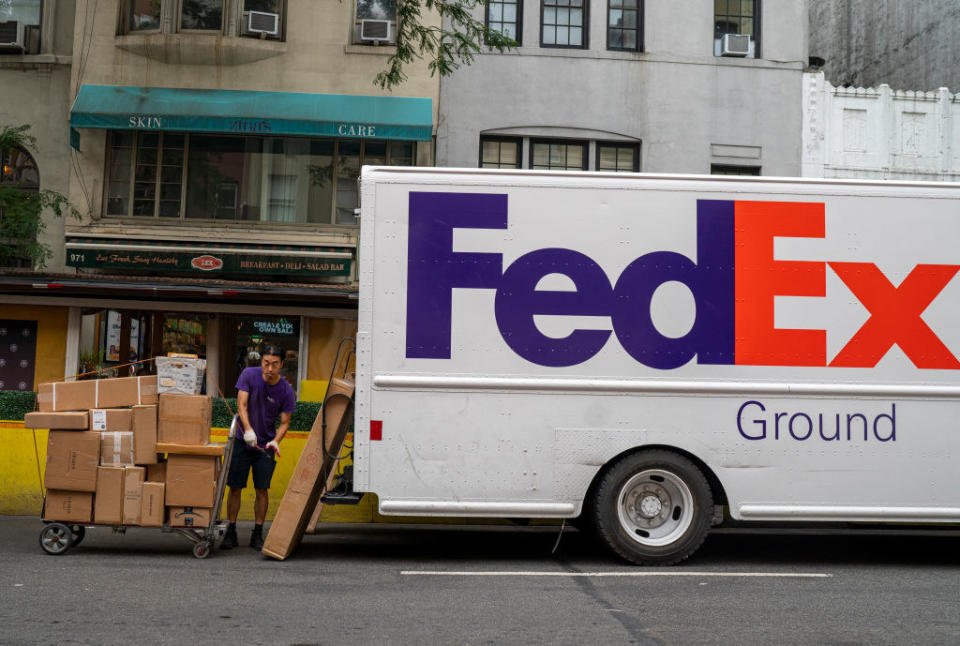 A FedEx truck making deliveries.