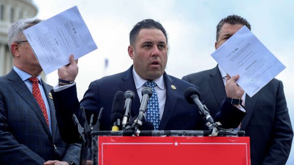 PHOTO: Rep. Anthony D'Esposito holds a copy of the 'No Fortune for Fraud' Act, a law prohibiting House lawmakers convicted of certain offenses from profiting off their fabrications, during a press conference on Capitol Hill in Washington, March 7, 2023. (Bonnie Cash/Reuters)