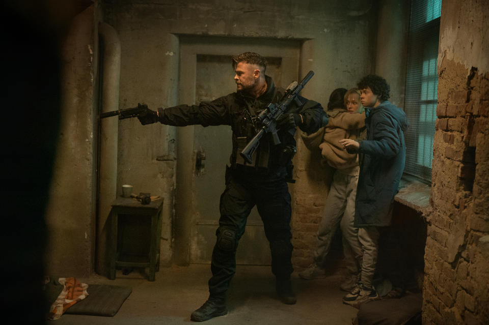 Extraction 2. (L-R) Chris Hemsworth as Tyler Rake, Miriam and Marta Kovziashvili as Nina, Tinatin Dalakishvili as Ketevan and Andro Jafaridze as Sandro in Extraction 2. Cr. Jasin Boland/Netflix © 2023