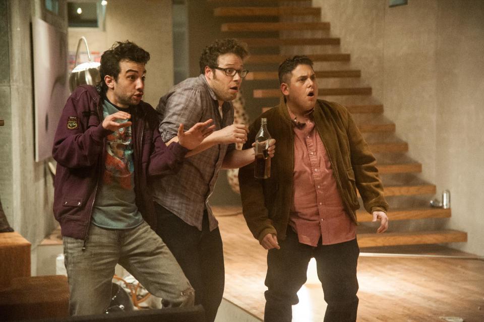 This film publicity image released by Columbia Pictures shows, from left, Jay Baruchel, Seth Rogen and Jonah Hill in a scene from "This Is The End." (AP Photo/Columbia Pictures - Sony, Suzanne Hanover)