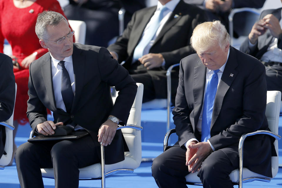 <p>North Atlantic Treaty Organization (NATO) Secretary General Jens Stoltenberg (L) chats with US President Donald J. Trump (R), who looks down during the inauguration ceremony of the new NATO Headquarters in Brussels, Belgium on May 25, 2017. (Robert Ghement/EPA) </p>