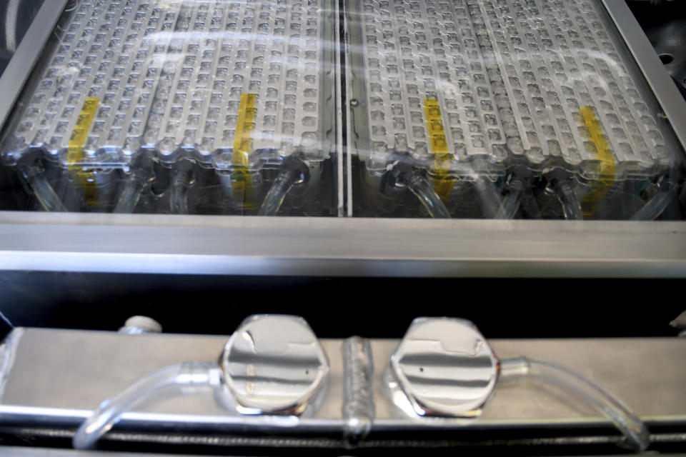 Tesla battery packs are seen in Kevin Erickson's electrified 1972 Plymouth Satellite at his Commerce City, Colo., home on Sept. 20, 2022. Erickson is part of a small but expanding group of tinkerers, racers, engineers, and entrepreneurs across the country converting vintage cars and trucks into greener, often much faster, electric vehicles. (AP Photo/Thomas Peipert)