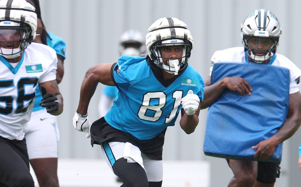 Carolina Panthers tight end Jordan Matthews, center, breaks off the line during drills on Thursday, July 25, 2024.