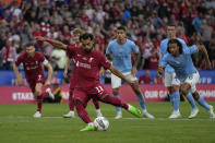 Liverpool's Mohamed Salah scores his side's second goal during the FA Community Shield soccer match between Liverpool and Manchester City at the King Power Stadium in Leicester, England, Saturday, July 30, 2022. (AP Photo/Frank Augstein)