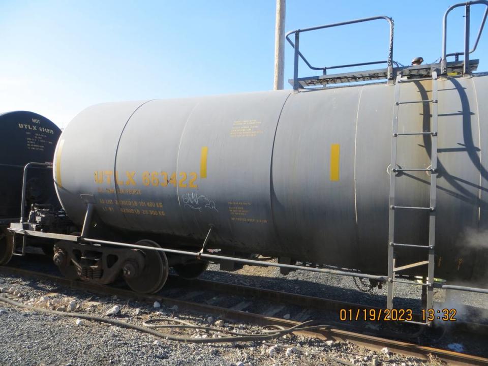A worker fell from this railcar at Two Rivers Terminal in Moses Lake after he was exposed to toxic hydrogen sulfide gas, according to Washington state officials.