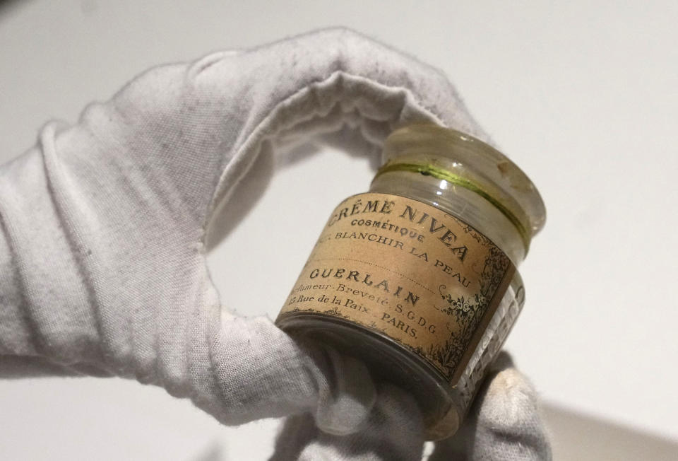 A pot of the original Nivea cream, invented by Guerlain and later bought by a German company of the same name is shown at the perfumer's archives department in Paris, Tuesday, May 30, 2023. (AP Photo/Michel Euler)